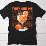 schwarzes Frauen T-Shirt Rückenprint mit "They see me aperolin" personalisiertesm Spruch als Sommer Geschenkidee von Love & Faith