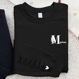 Schwarzer Sweater für Mama mit Kindernamen personalisierte Geschenkidee zum Muttertag von Love & Faith