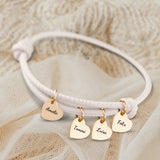 creme Lederarmband mit Gravur von gold Herzanhängern personalisierte Geschenkidee von Love & Faith